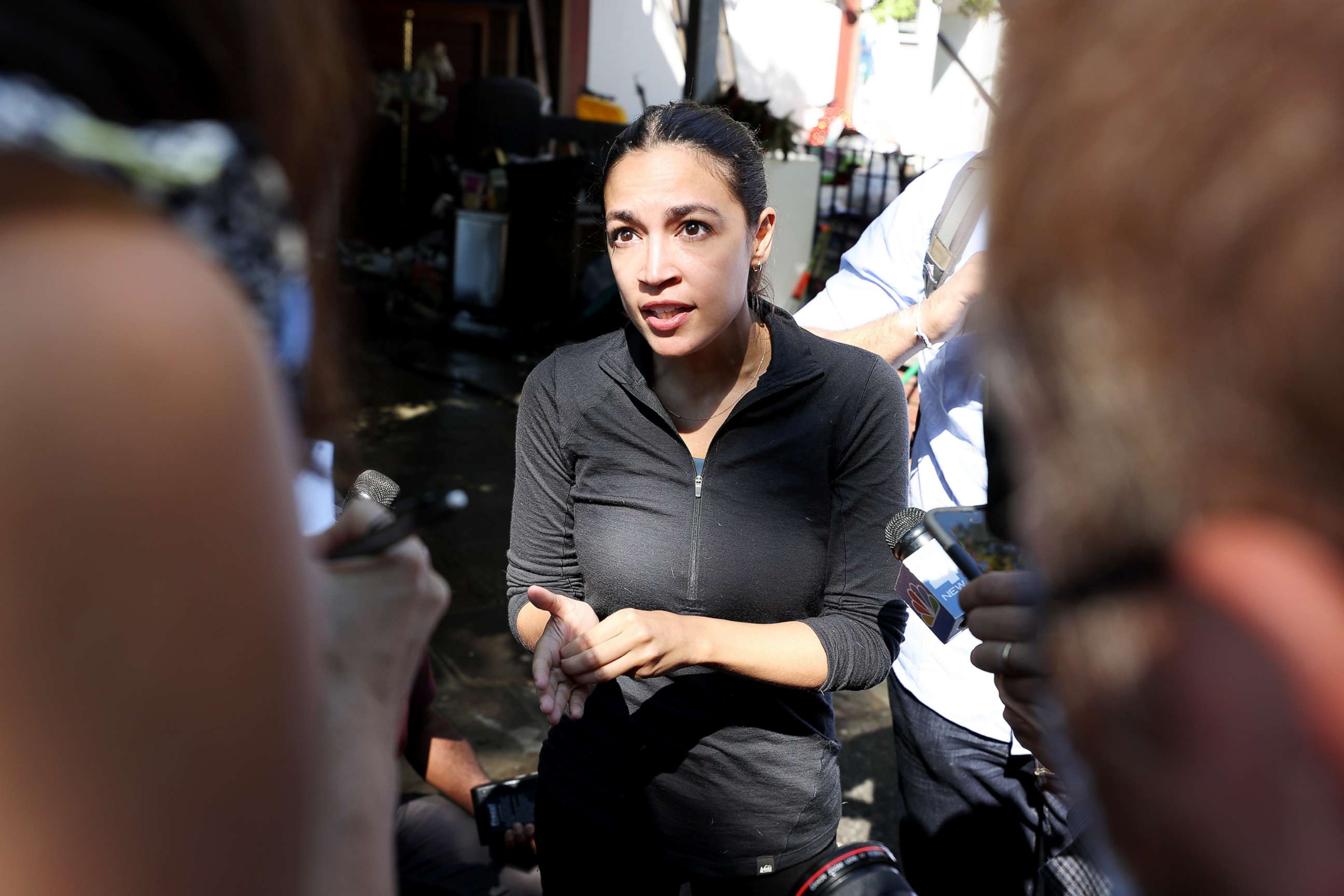 PHOTO: Rep. Alexandria Ocasio-Cortez speaks during the survey storm damage in Woodside, Queens area of New York, Sept. 6, 2021.