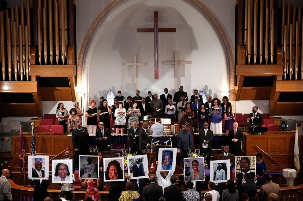 PHOTO: In this June 19, 2015, file photo, photographs of the nine victims killed at the Emanuel African Methodist Episcopal Church in Charleston, S.C., are held up by congregants during a prayer vigil at the the Metropolitan AME Church, in Washington, DC.