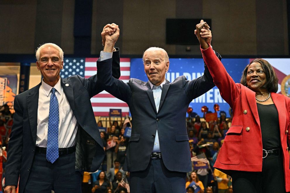 PHOTO: Charlie Crist, Democratic Gubernatorial candidate for Florida, President Joe Biden and Val Demings, Democratic Senatorial candidate for Florida at a campaign event, Nov. 1, 2022, in Miami Gardens, Fla.