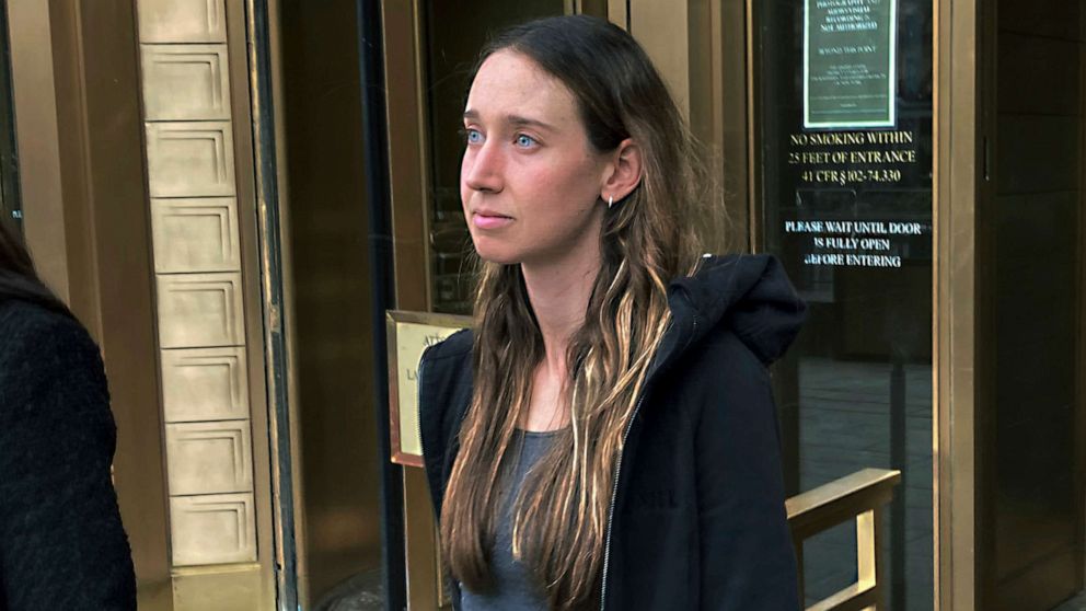 PHOTO: Charlie Javice leaves Manhattan federal court, April 4, 2023, in New York, after signing a $2-million bond to remain free on charges that she duped J.P. Morgan Chase with fake records to acquire Frank, her startup company, for $175-million.