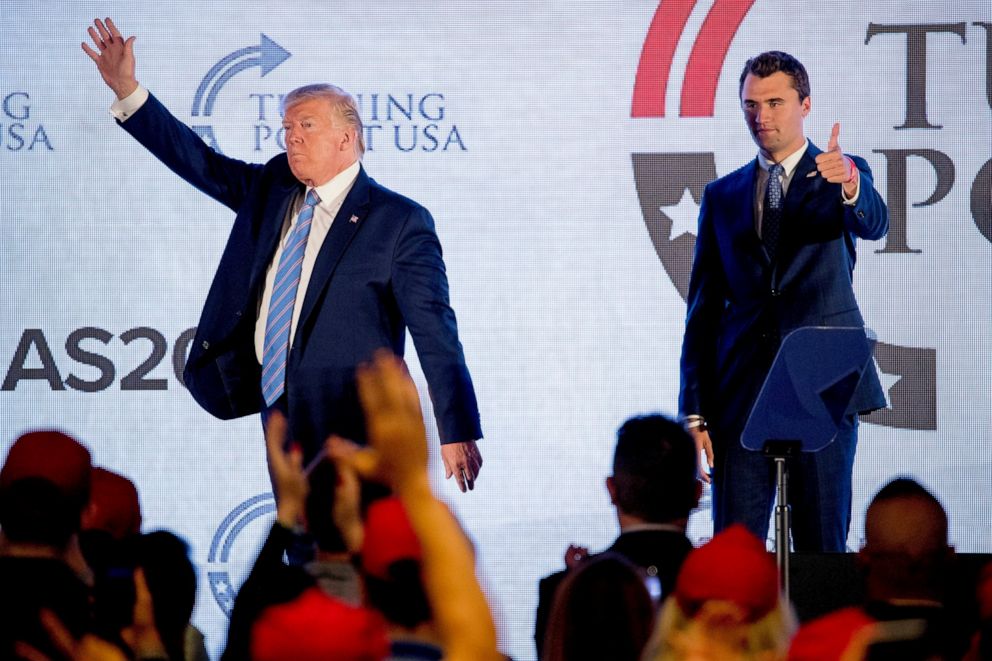 PHOTO: President Donald Trump is joined on stage with Turning Point USA Founder Charlie Kirk as he finishes speaking at Turning Point USA Teen Student Action Summit at the Marriott Marquis in Washington, Tuesday, July 23, 2019.