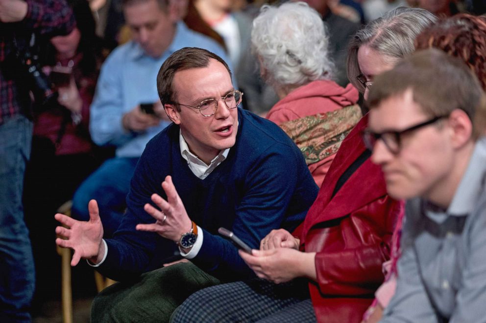 PHOTO: Chasten Buttigieg, the husband of Democratic presidential candidate Pete Buttigieg, speaks with a member of the audience during a FOX News Channel Town Hall in Des Moines, Iowa, Jan. 26, 2020.