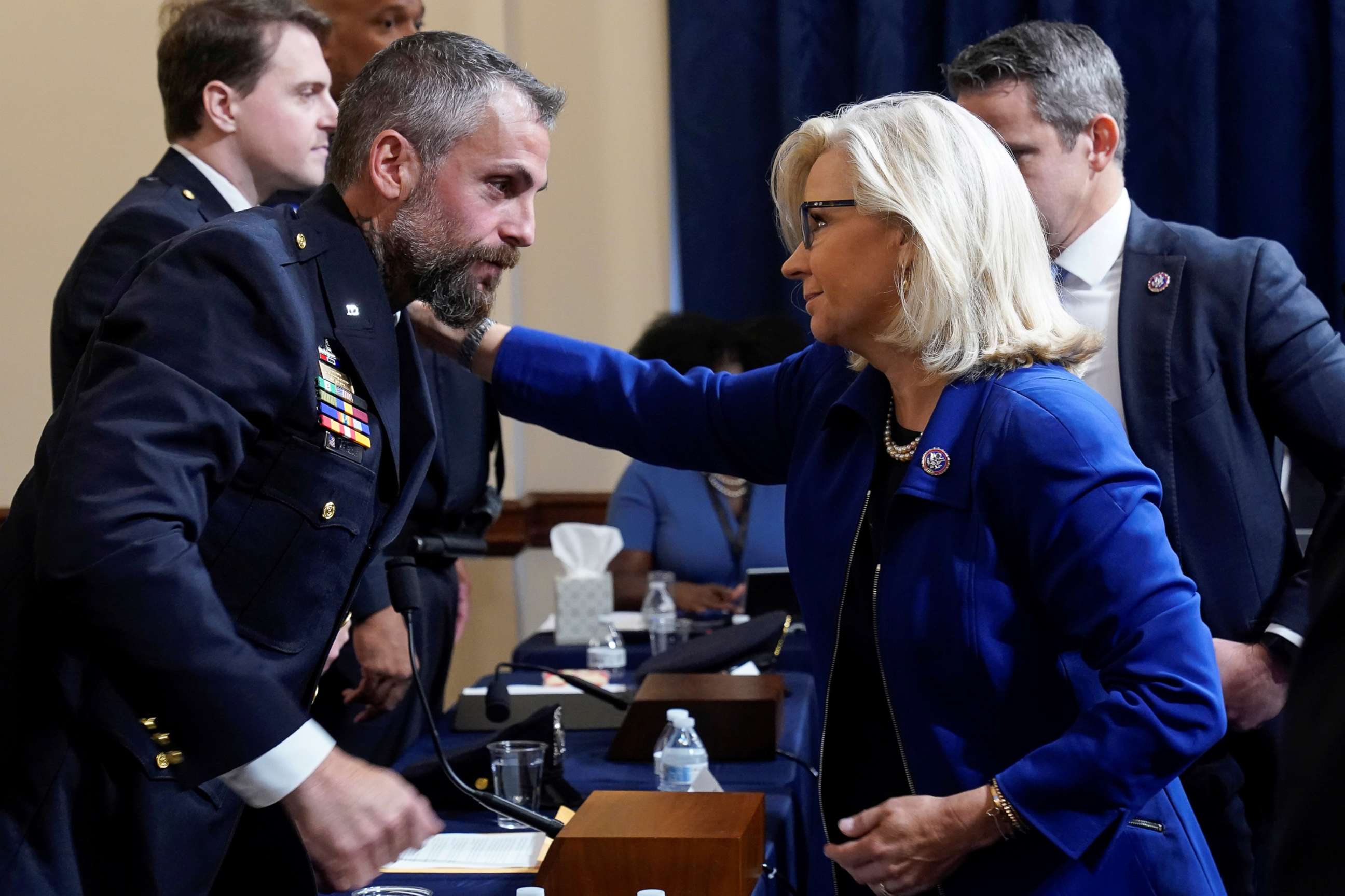 PHOTO: Rep. Liz Cheney greets Washington Metropolitan Police Department officer Michael Fanone before the first House select committee hearing on the Jan. 6 attack on Capitol Hill in Washington, D.C., July 27, 2021.