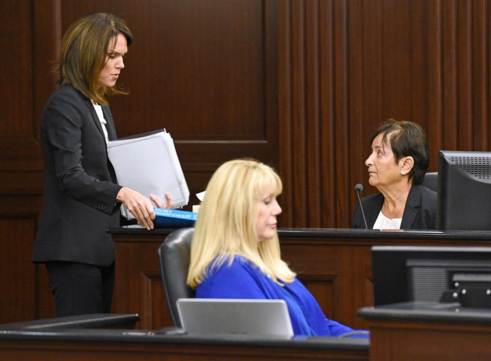 PHOTO: State Attorney Melissa Nelson, left, goes over photos of Cherish Perrywinkle's autopsy with Duval County Medical Examiner Dr. Valerie Rao, right as she testified in Donald Smith's trial, Feb. 13, 2018, in Jacksonville, Fla.