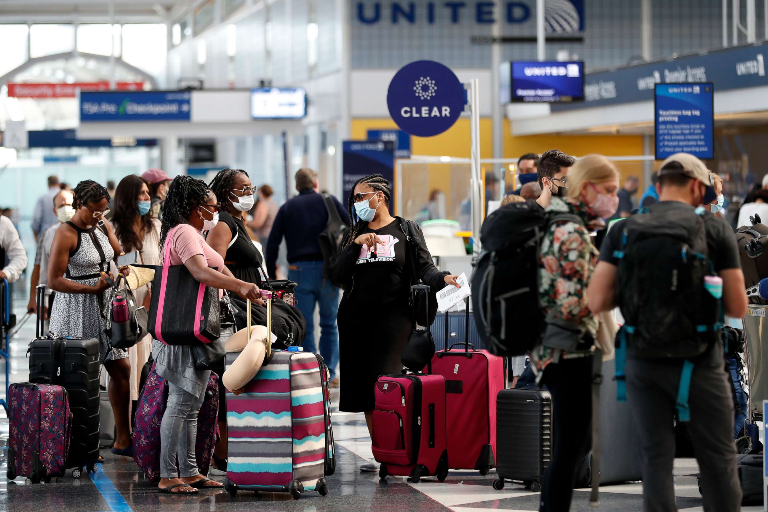 PHOTO: People wait in line at O'Hare International Airport in Chicago, ahead of Fourth of July weekend, July 1, 2021.