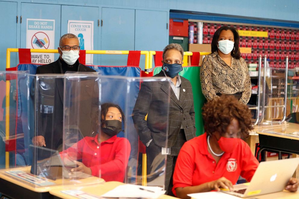 PHOTO: Chicago Mayor Lori E. Lightfoot, center, Chicago Public Schools CEO Janice K. Jackson, right and ward commissioner Alderman William Burnett, left, observe a classroom during their tour, Feb. 11, 2021, at the William H. Brown Elementary School.