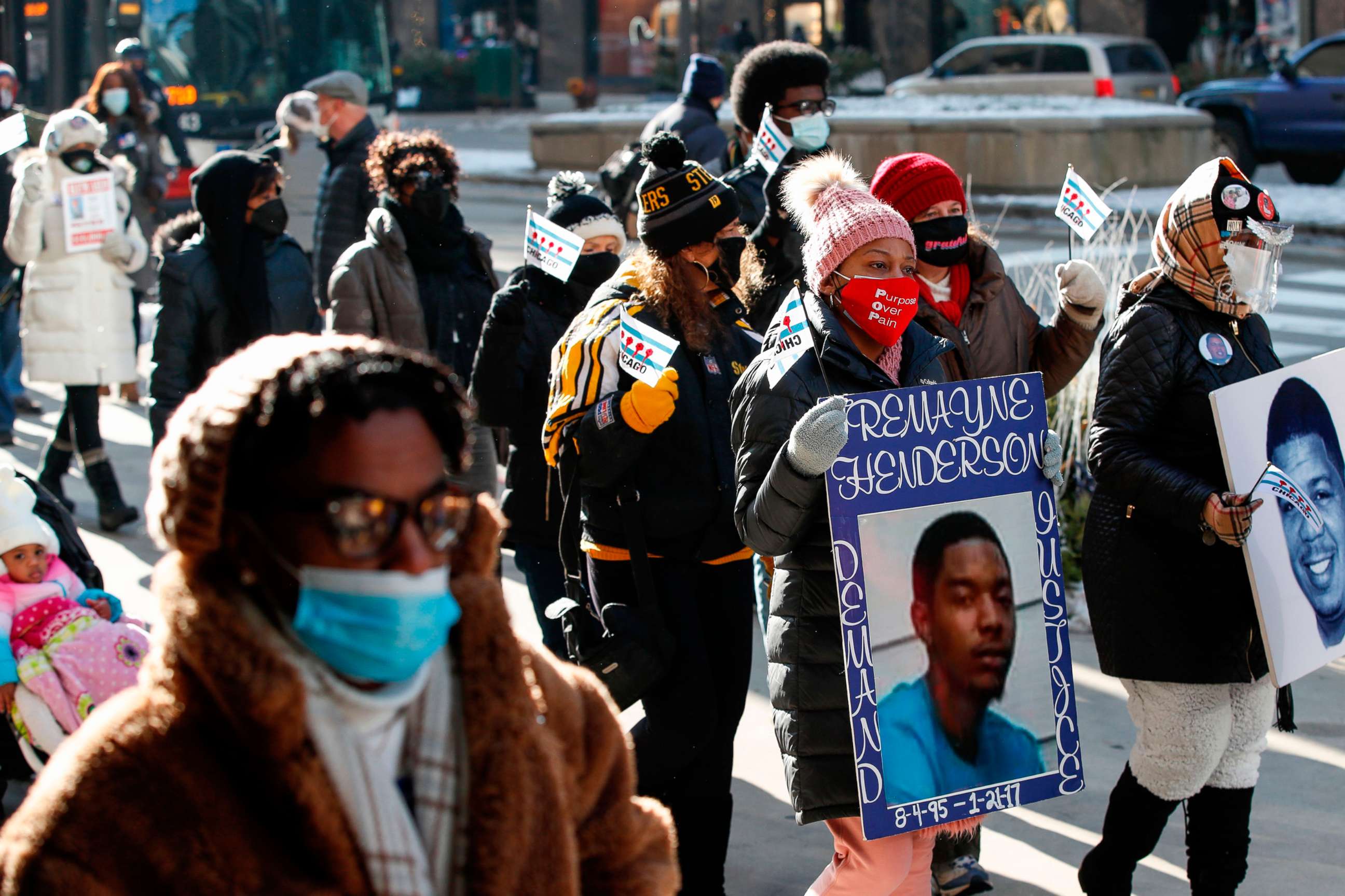 PHOTO: People participate in a march against gun violence on the Magnificent Mile in Chicago on Dec. 31, 2020.