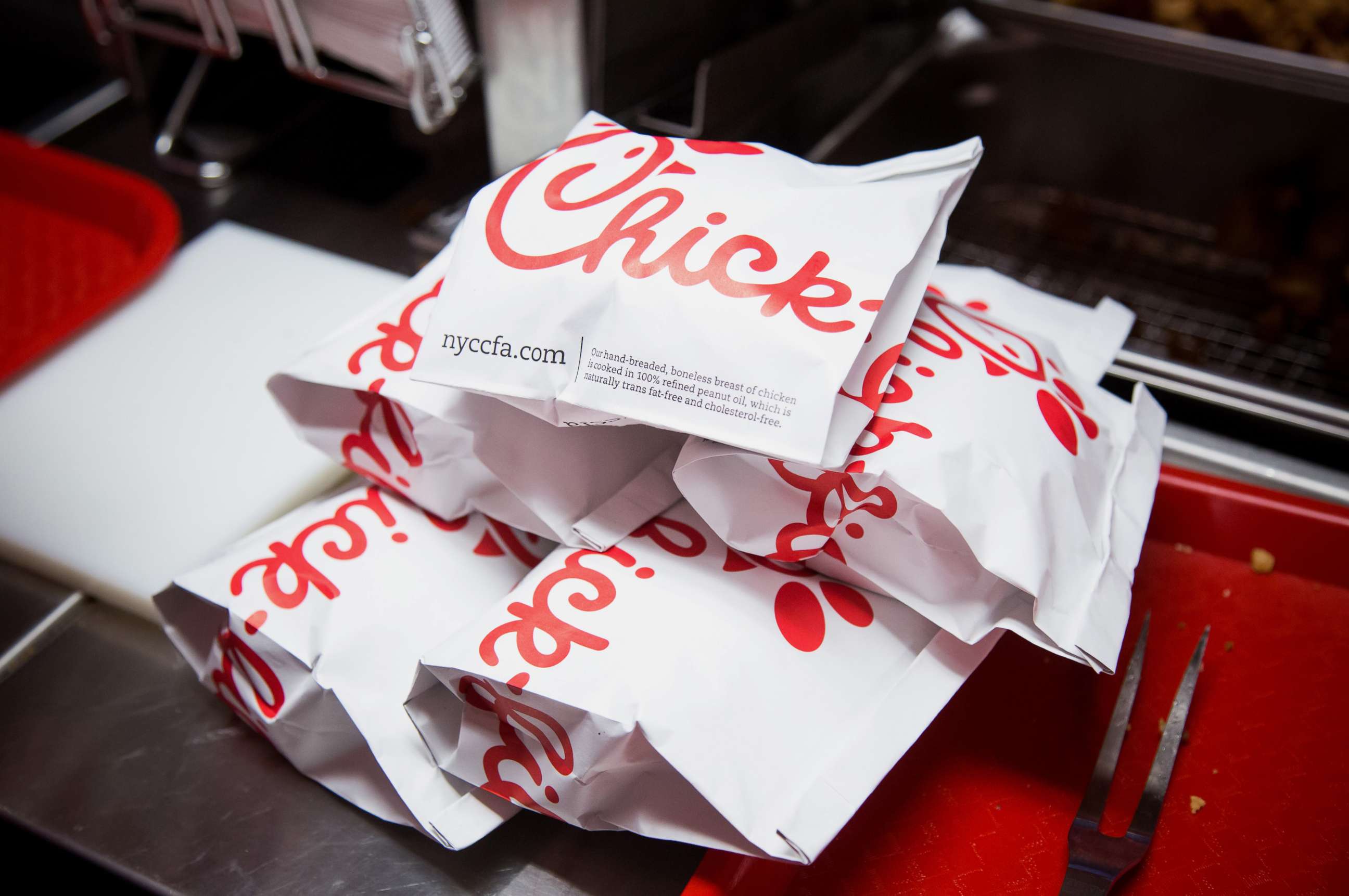 PHOTO: Prepared chicken sandwiches sit in a piie before being served to guests during an event ahead of the grand opening for a Chick-fil-A restaurant in New York, Oct. 2, 2015.