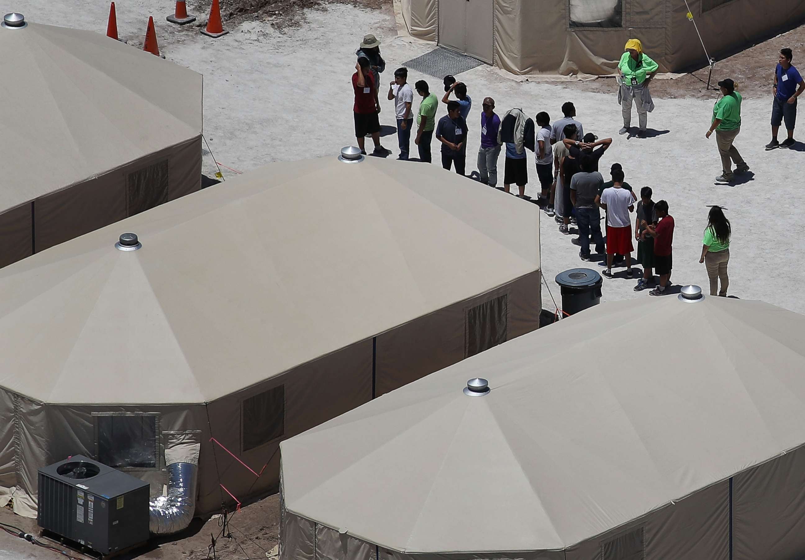 PHOTO: Children and workers are seen at a tent encampment recently built near the Tornillo Port of Entry on June 19, 2018 in Tornillo, Texas.