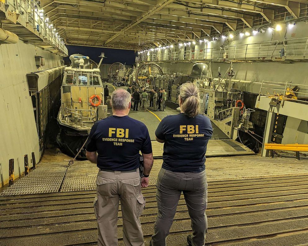 PHOTO: FBI Evidence Response Team Members aboard a Department of Defense vessel assigned to recover efforts off the coast of South Carolina.