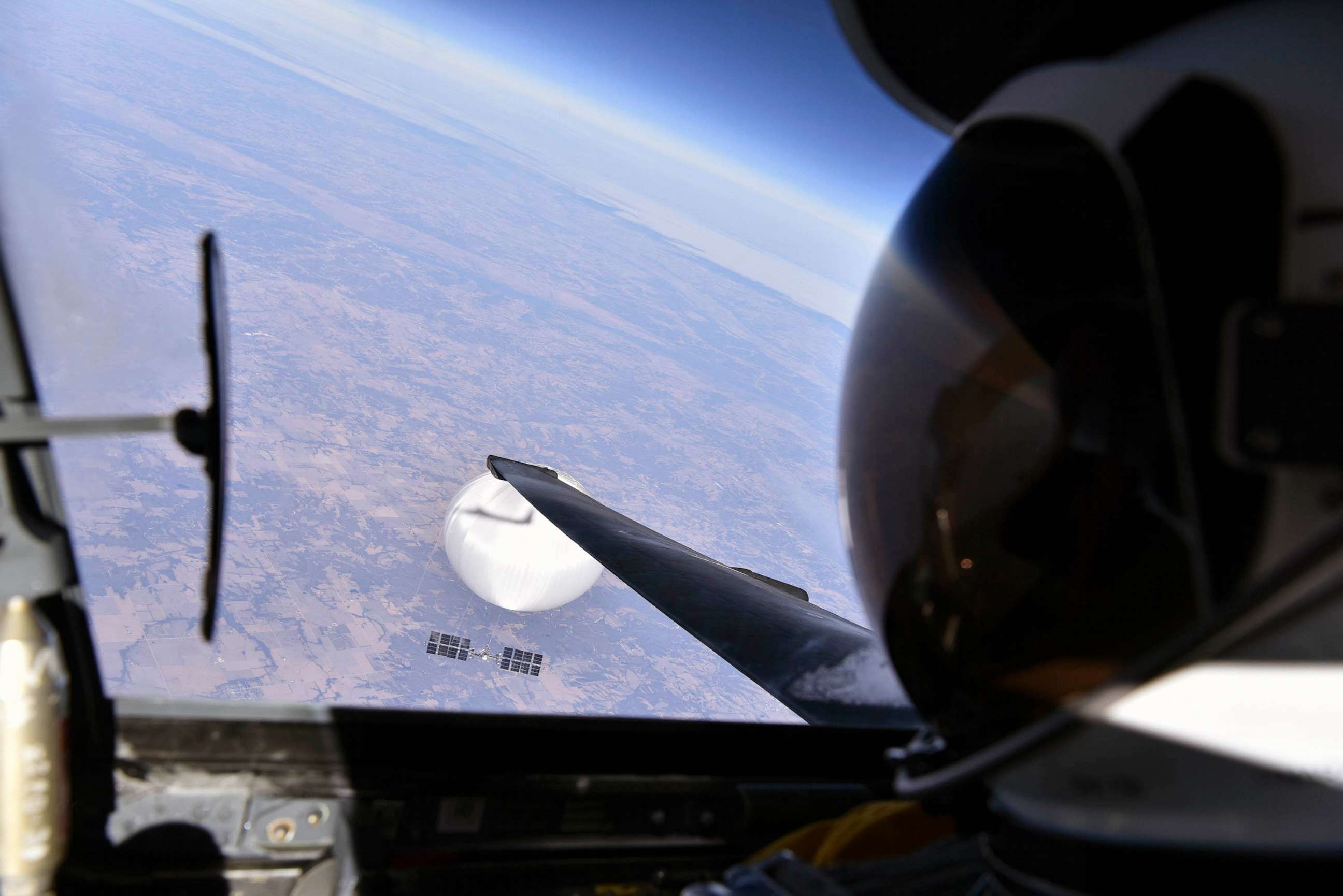 PHOTO: A U.S. Air Force pilot looked down at the suspected Chinese surveillance balloon as it hovered over the Central Continental United States, Feb. 3, 2023.