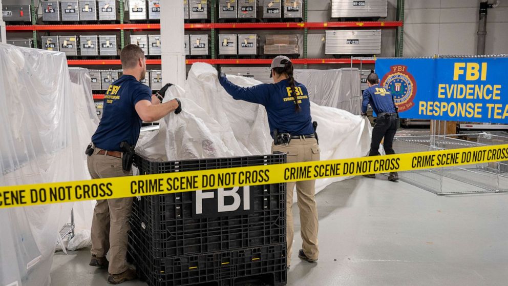 PHOTO: FBI Special Agents assigned to the Evidence Response Team process material recovered from the High Altitude Balloon recovered off the coast of South Carolina. The material was processed and transported to the FBI Laboratory in Quantico, VA.