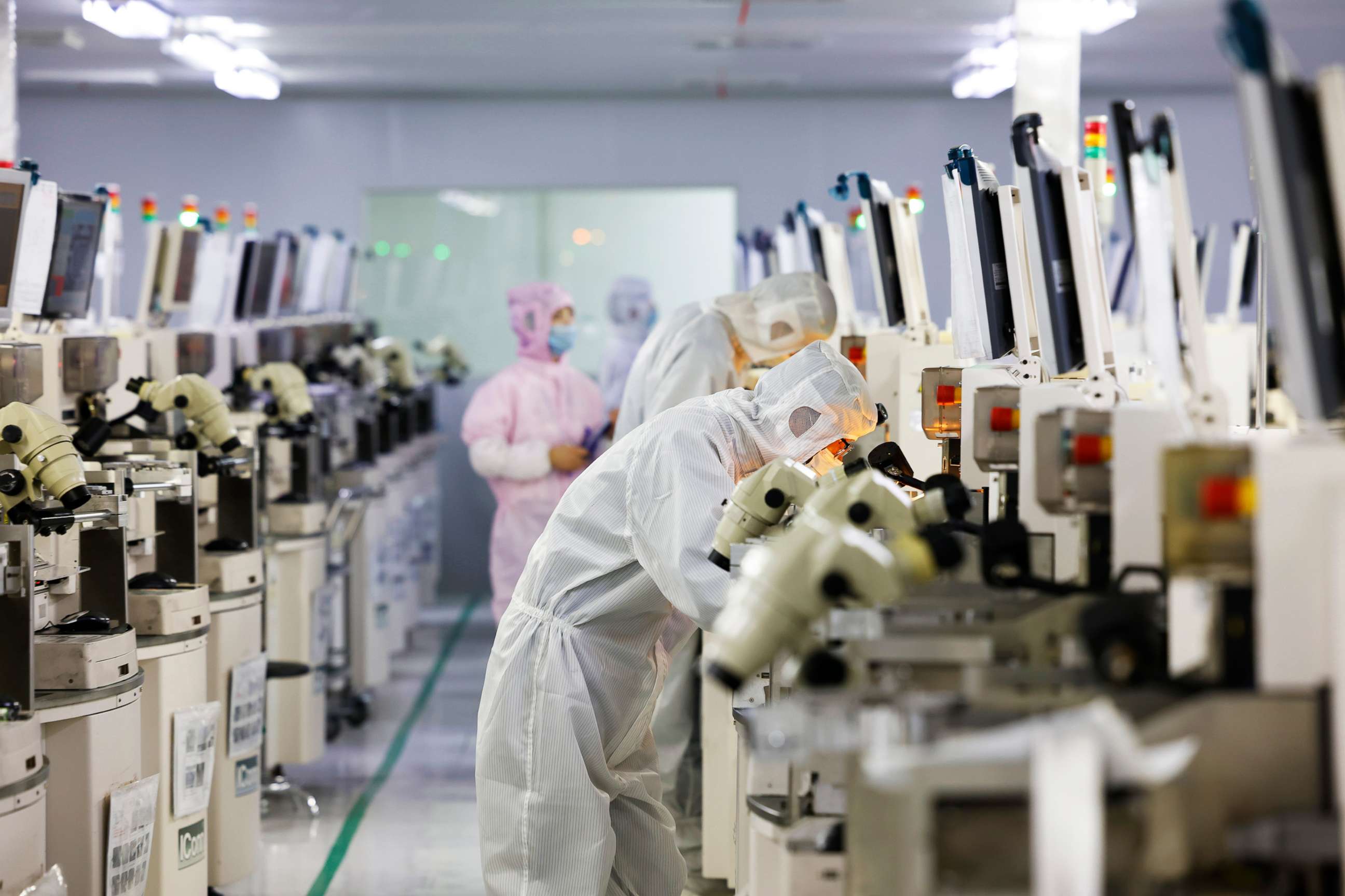 PHOTO: Employees work at a chip manufacturing company on April 19, 2022 in Suqian, Jiangsu Province of China.