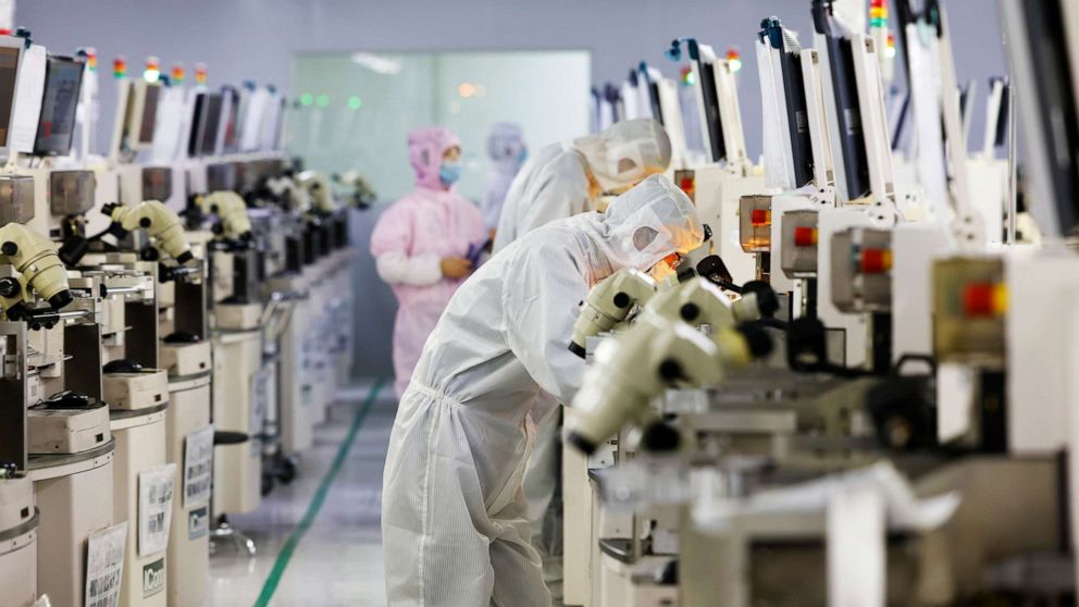 PHOTO: Employees work at a chip manufacturing company on April 19, 2022 in Suqian, Jiangsu Province of China.