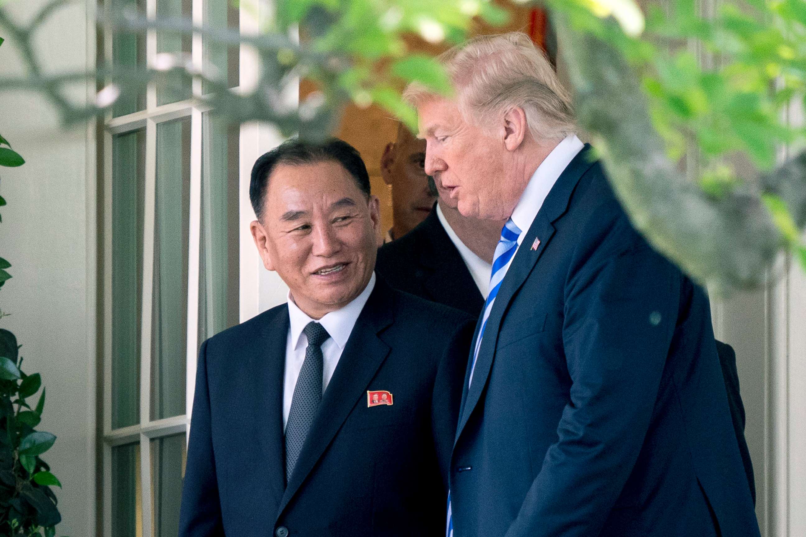 PHOTO: President Donald Trump talks with Kim Yong Chol, former North Korean military intelligence chief as they walk from their meeting in the Oval Office of the White House, June 1, 2018.