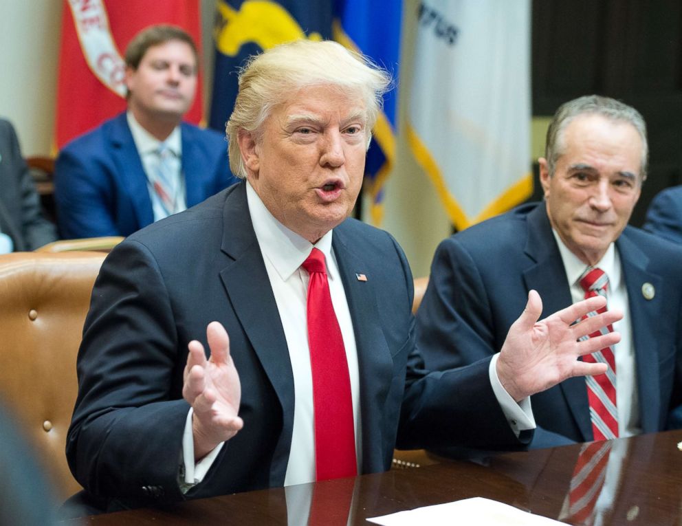 PHOTO: President Donald Trump and Rep. Chris Collins participate in a congressional listening session with GOP members in the Roosevelt Room of the White House February 16, 2017 in Washington.