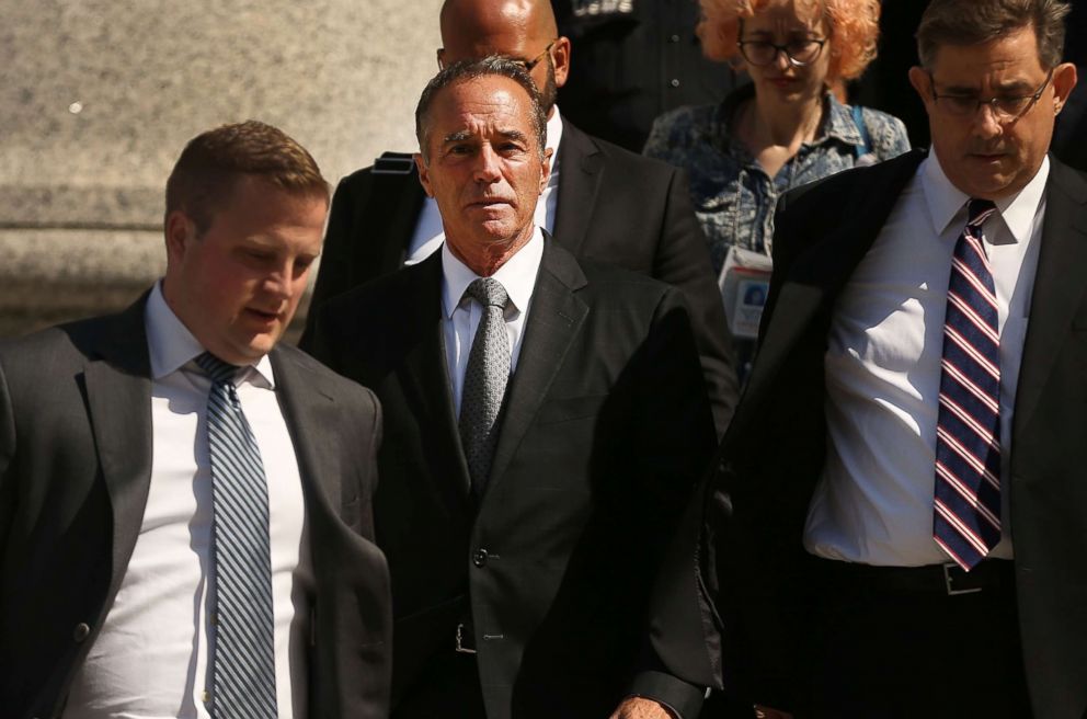 PHOTO: Rep. Chris Collins walks out of a New York court house after being charged with insider trading in New York City, Aug. 8, 2018.