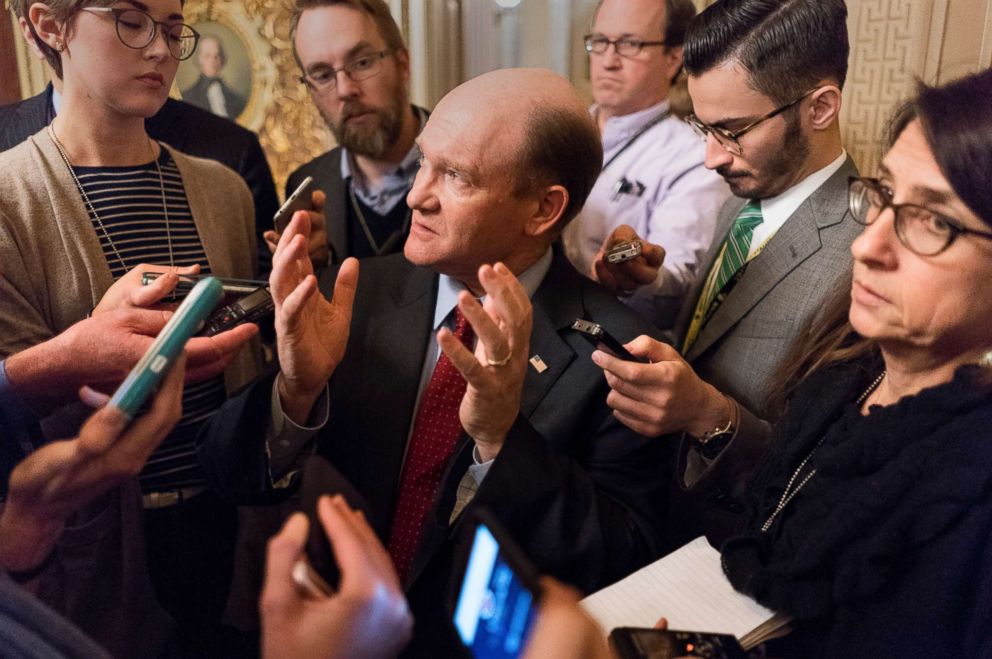 PHOTO: Sen. Chris Coons talks to reporters after a meeting with fellow Democrats on Capitol Hill in Washington, D.C.,  Jan. 19, 2018.