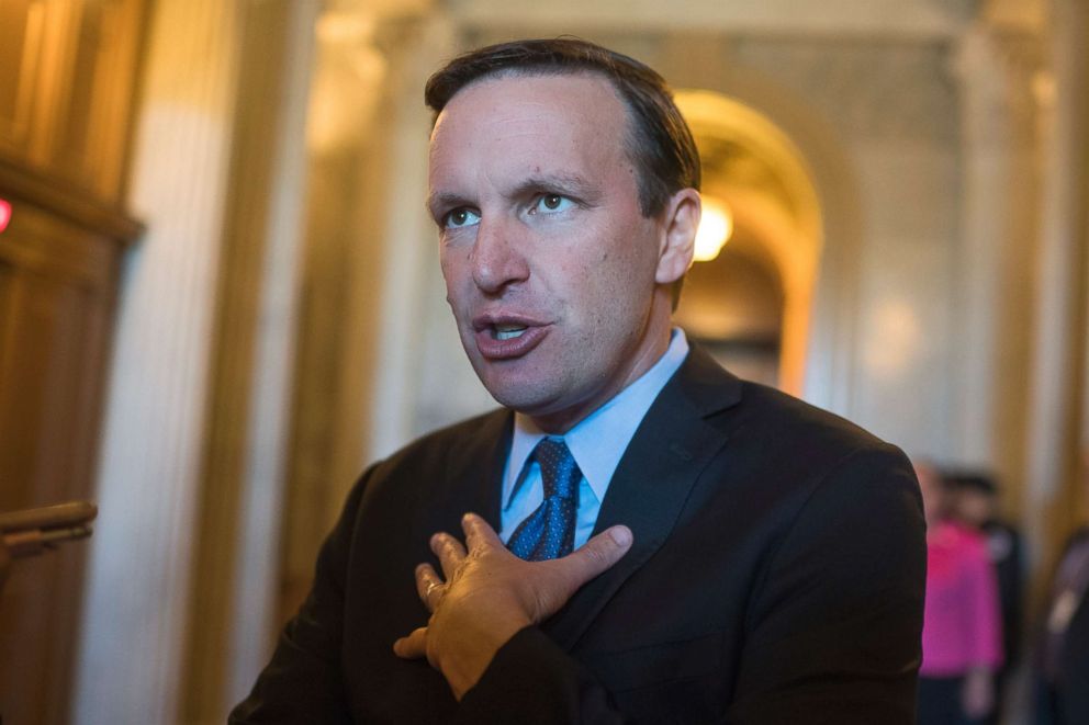 PHOTO: Sen. Chris Murphy talks with reporters in the Capitol after the Senate Policy luncheon, Oct. 3, 2017.