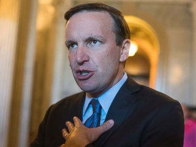 PHOTO: Sen. Chris Murphy talks with reporters in the Capitol after the Senate Policy luncheon, Oct. 3, 2017.