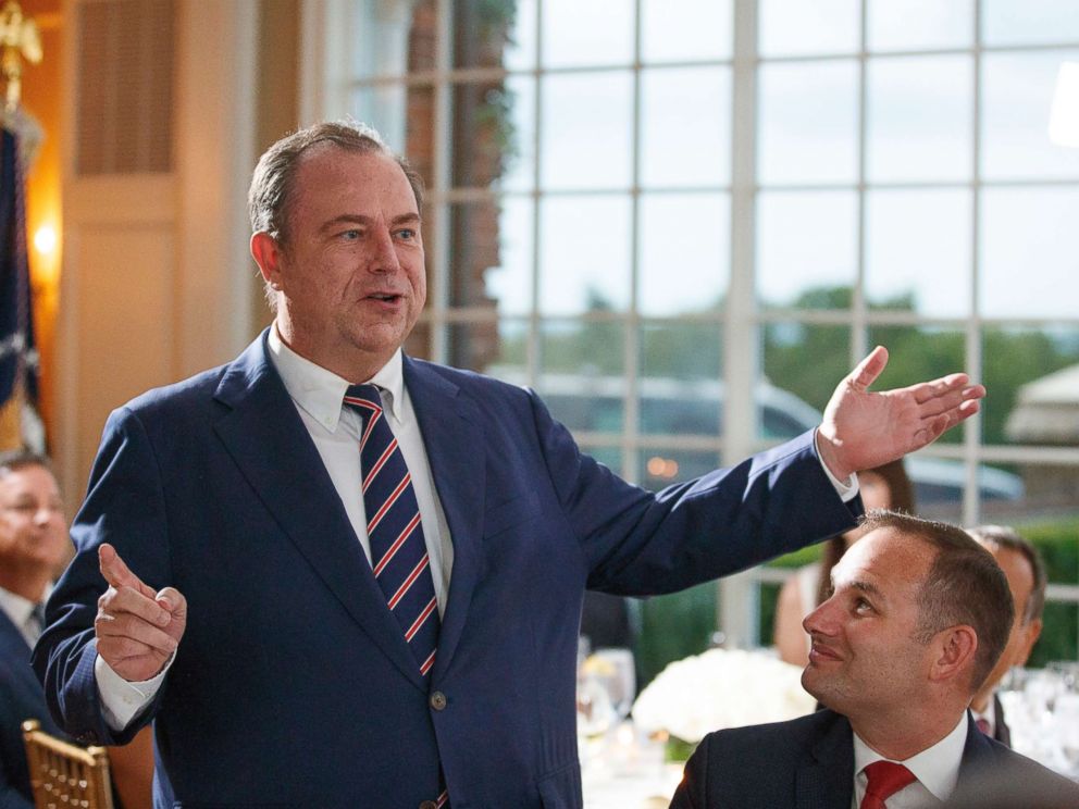 PHOTO: Newsmax CEO Chris Ruddy speaks during a dinner meeting with President Donald Trump and other business leaders, Aug. 7, 2018, at Trump National Golf Club in Bedminster, N.J.