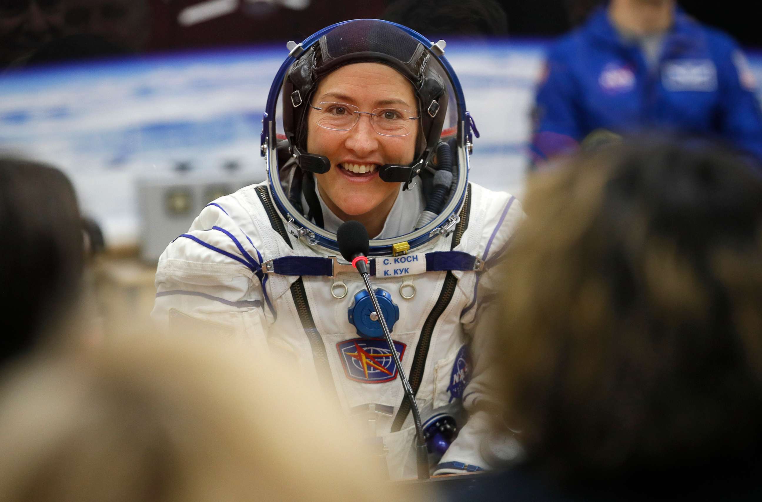 PHOTO: U.S. astronaut Christina Koch, member of the main crew of the expedition to the International Space Station (ISS), speaks with her relatives through a safety glass in Kazakhstan, March 14, 2019.