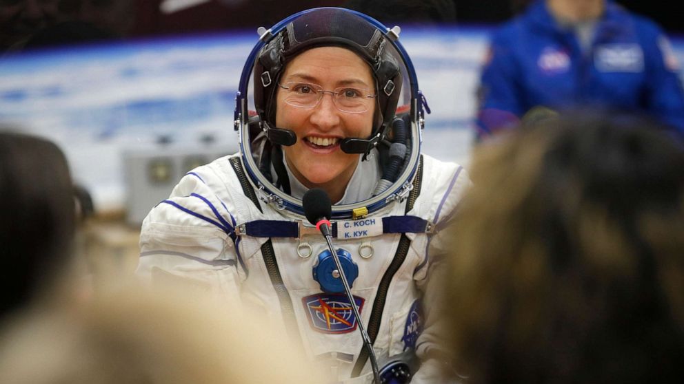 PHOTO: U.S. astronaut Christina Koch, member of the main crew of the expedition to the International Space Station (ISS), speaks with her relatives through a safety glass in Kazakhstan, March 14, 2019.