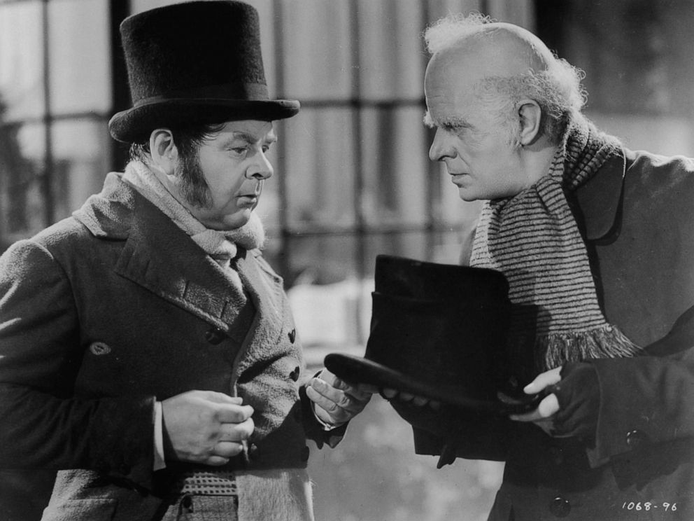 PHOTO: Gene Lockhart, left, as Bob Cratchit, talking to Reginald Owen, right, as Ebenezer Scrooge, in a scene from the film "A Christmas Carol," released in 1938.