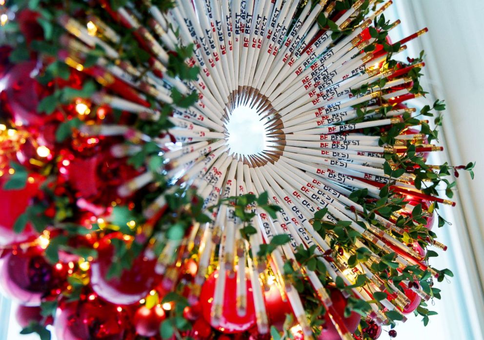 PHOTO: A Christmas wreath made out of "Be Best" pencils hangs in a window of the White House Red Room which is decorated with the theme of first lady Melania Trump's "Be Best" campaign during the 2018 Christmas Press Preview, Nov. 26, 2018. 