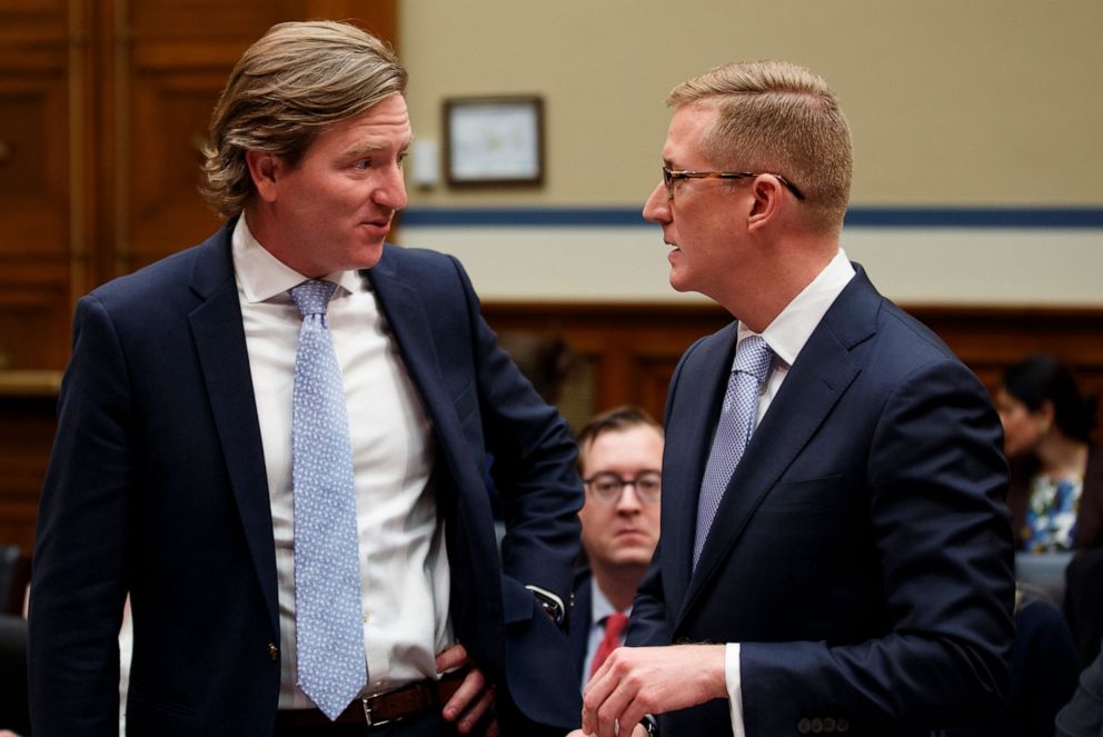 PHOTO: Deputy Assistant Attorney General for National Security Adam Hickey, right, and Department of Homeland Security Cybersecurity and Infrastructure Security Agency Director Christopher Krebs talk on Capitol Hill in Washington, May 22, 2019.