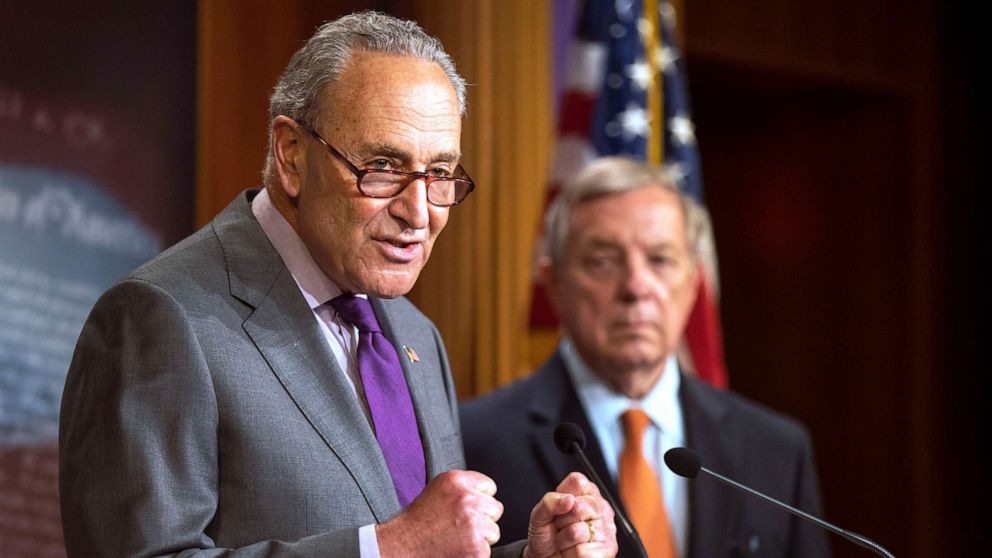 PHOTO: Senate Minority Leader Chuck Schumer speaks as Sen. Dick Durbin looks on, during a news conference on Capitol Hill, June 30, 2020, in Washington.