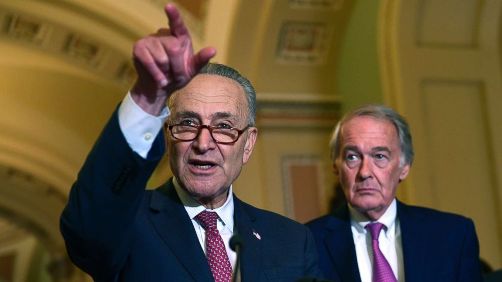 PHOTO: Senate Minority Leader Sen. Chuck Schumer of N.Y., standing with Sen. Edward Markey, D-Mass., speaks to reporters following the weekly Democratic policy luncheon on Capitol Hill in Washington, Oct. 31, 2017. 