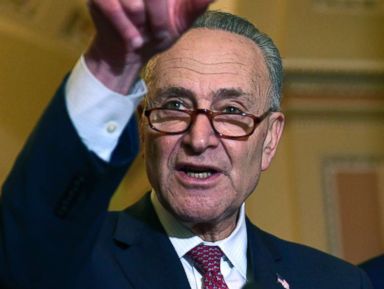 PHOTO: Senate Minority Leader Sen. Chuck Schumer of N.Y., standing with Sen. Edward Markey, D-Mass., speaks to reporters following the weekly Democratic policy luncheon on Capitol Hill in Washington, Oct. 31, 2017.