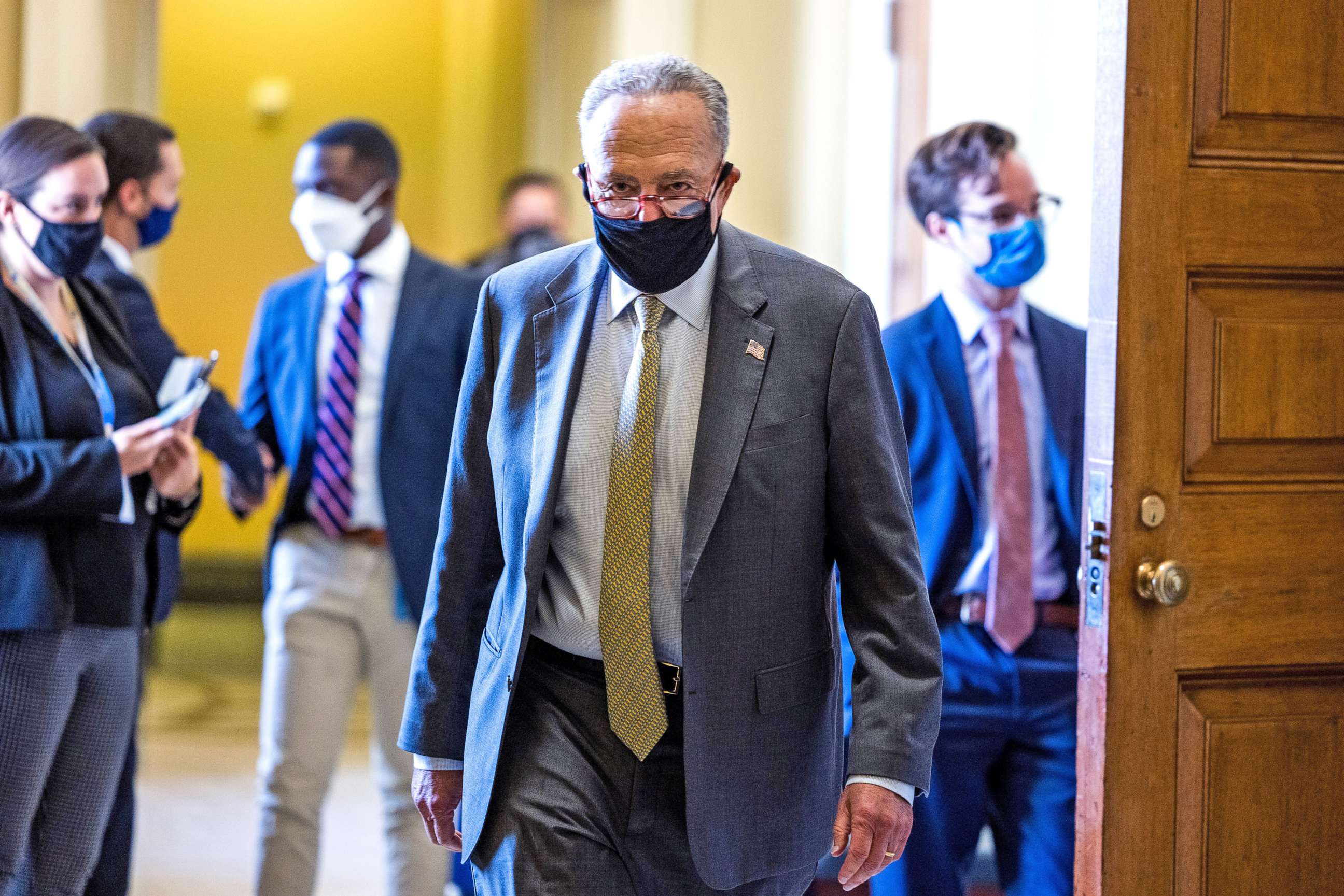 PHOTO: Senate Majority Leader Chuck Schumer walks to the Senate floor following Senate passage of a stopgap funding bill to prevent a government shutdown in the U.S. Capitol Washington, D.C., Sept. 30, 2021.