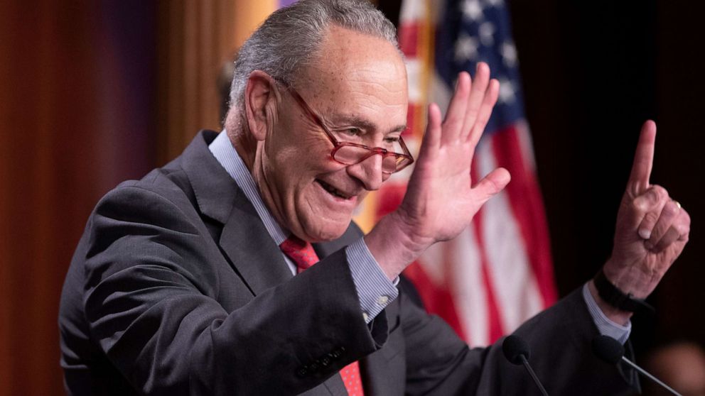 PHOTO: Chuck Schumer makes a gesture to represent the number 'fifty-one', during a news conference held to discuss the expansion of Democrats' majority in the Senate, on Capitol Hill in Washington D.C. Dec. 7, 2022.