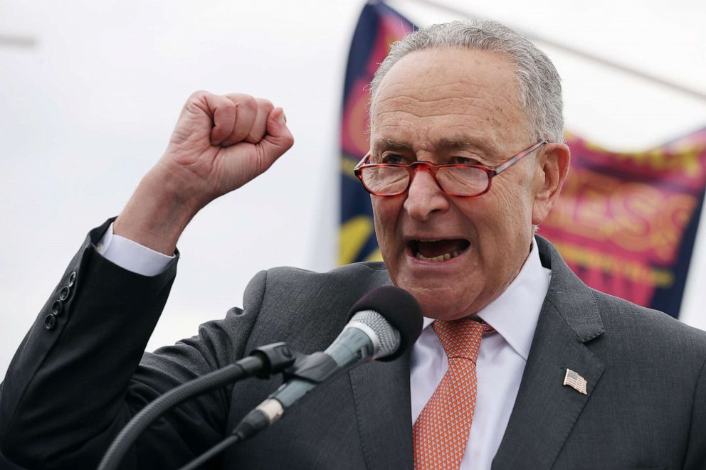 PHOTO: Senate Majority Leader Charles Schumer addresses thousands of demonstrators from across the country as they rally in support of a pathway to citizenship on the National Mall, Sept. 21, 2021 in Washington, DC.