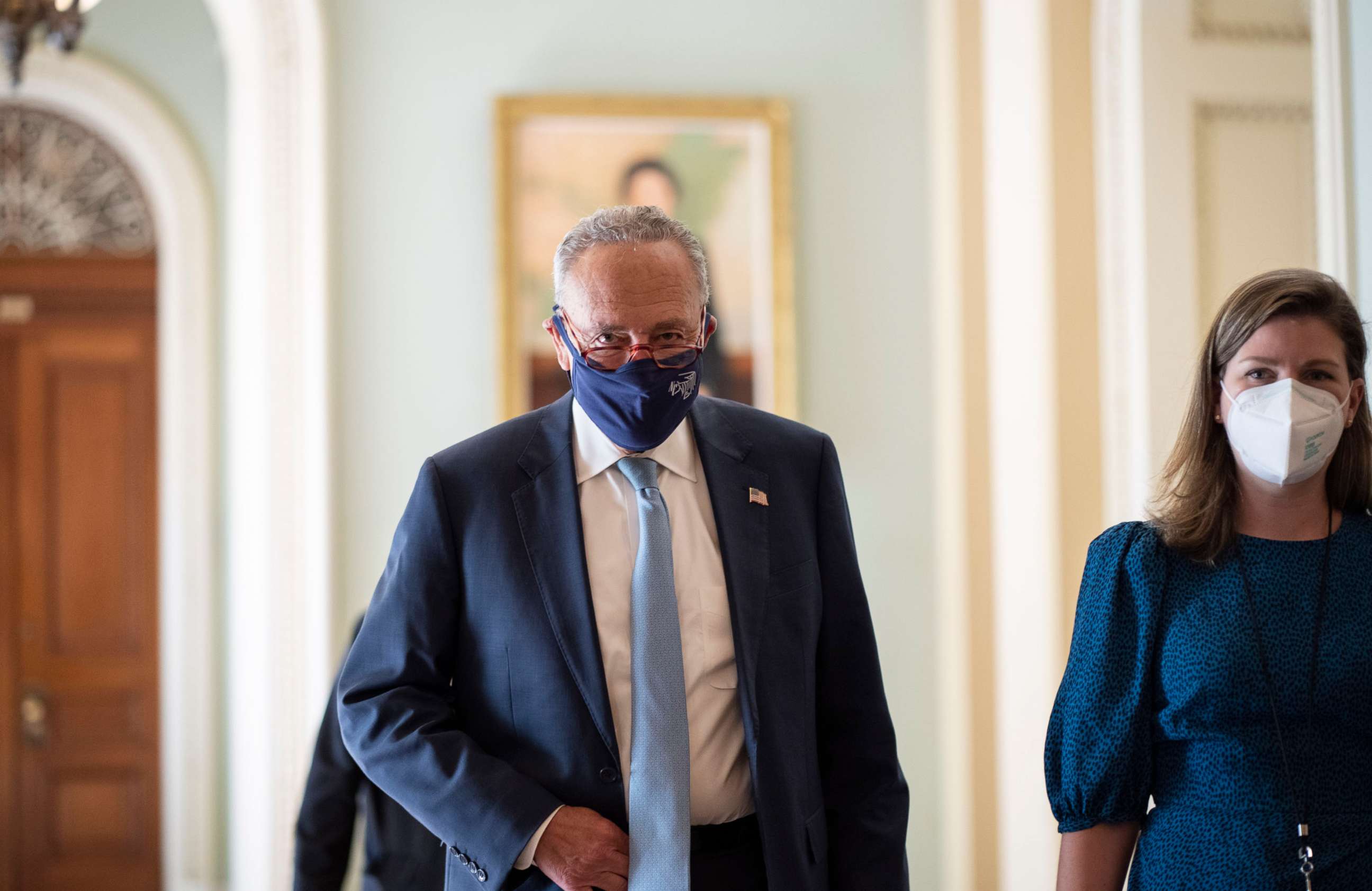 PHOTO: Senate Majority Leader Chuck Schumer walks to a lunch meeting with Senate Democrats at the U.S. Capitol, Oct. 7, 2021, in Washington, D.C.