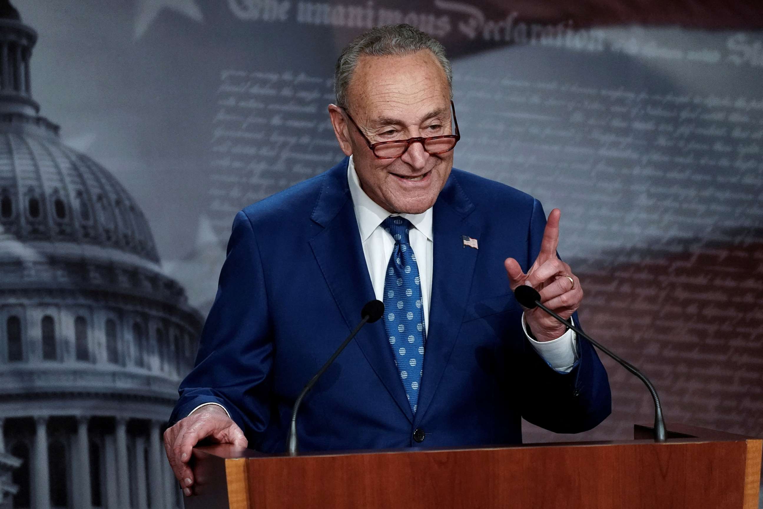 PHOTO: Senate Majority Leader Chuck Schumer speaks to the media following the 51-50 vote passing of the "Inflation Reduction Act of 2022" on Capitol Hill in Washington, D.C., Aug. 7, 2022.