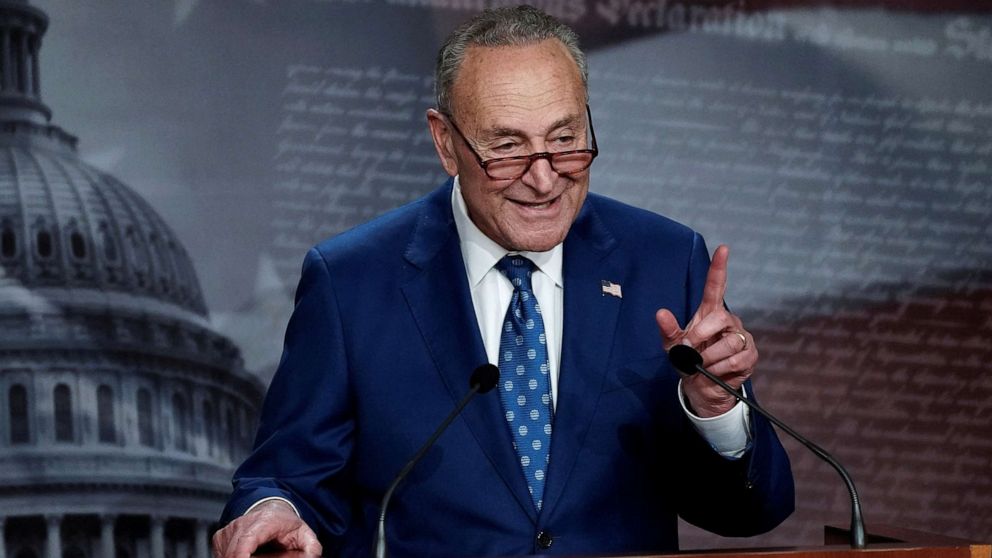 PHOTO: Senate Majority Leader Chuck Schumer speaks to the media following the 51-50 vote passing of the "Inflation Reduction Act of 2022" on Capitol Hill in Washington, D.C., Aug. 7, 2022.