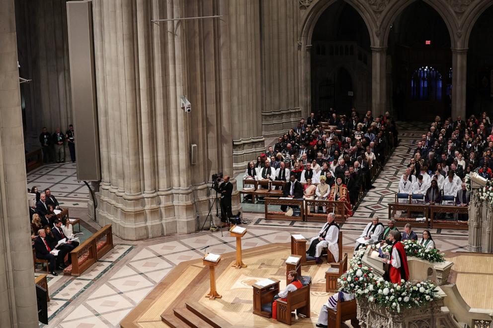 PHOTO: President Donald Trump (lower L) looks on as Rt. Rev. Mariann Edgar Budde (lower R) speaks during the National Prayer Service at the Washington National Cathedral in Washington, DC, on Jan. 21, 2025.