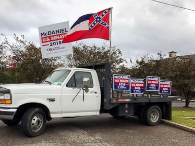 PHOTO: A truck covered in Chris McDaniel campaign signs sits parked outside of a campaign stop for opponent Sen. Cindy Hyde-Smith in Nesbit, Miss., Oct. 26, 2018.