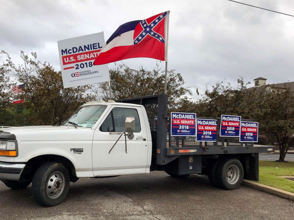 PHOTO: A truck covered in Chris McDaniel campaign signs sits parked outside of a campaign stop for opponent Sen. Cindy Hyde-Smith in Nesbit, Miss., Oct. 26, 2018.