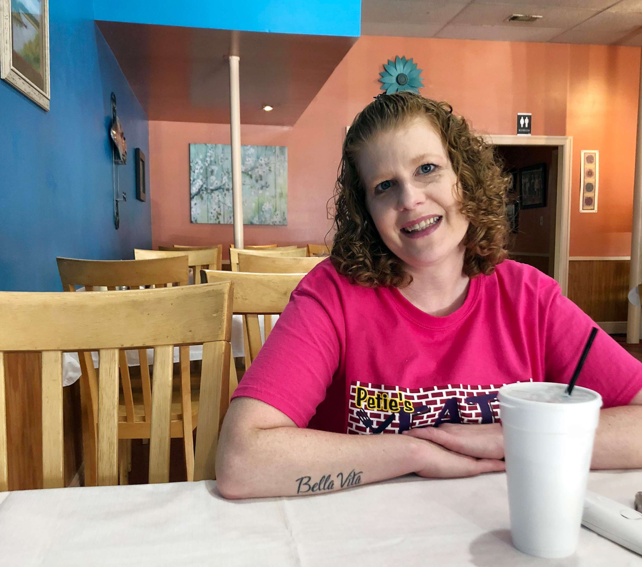 PHOTO: Elizabeth West, 42, a resident of Gulfport, Miss., sits inside local restaurant, Petie's Eats Downtown, Oct. 28, 2018.