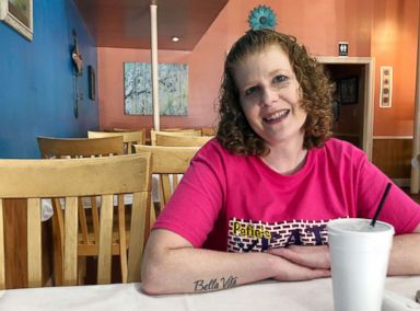 PHOTO: Elizabeth West, 42, a resident of Gulfport, Miss., sits inside local restaurant, Peties Eats Downtown, Oct. 28, 2018.
