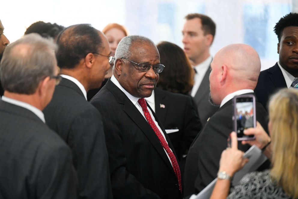 PHOTO: Justice Clarence Thomas of the Supreme Court of the United States mingles after delivering a keynote address during a dedication of Georgia's new Nathan Deal Judicial Center, Tuesday, Feb. 11, 2020, in Atlanta.