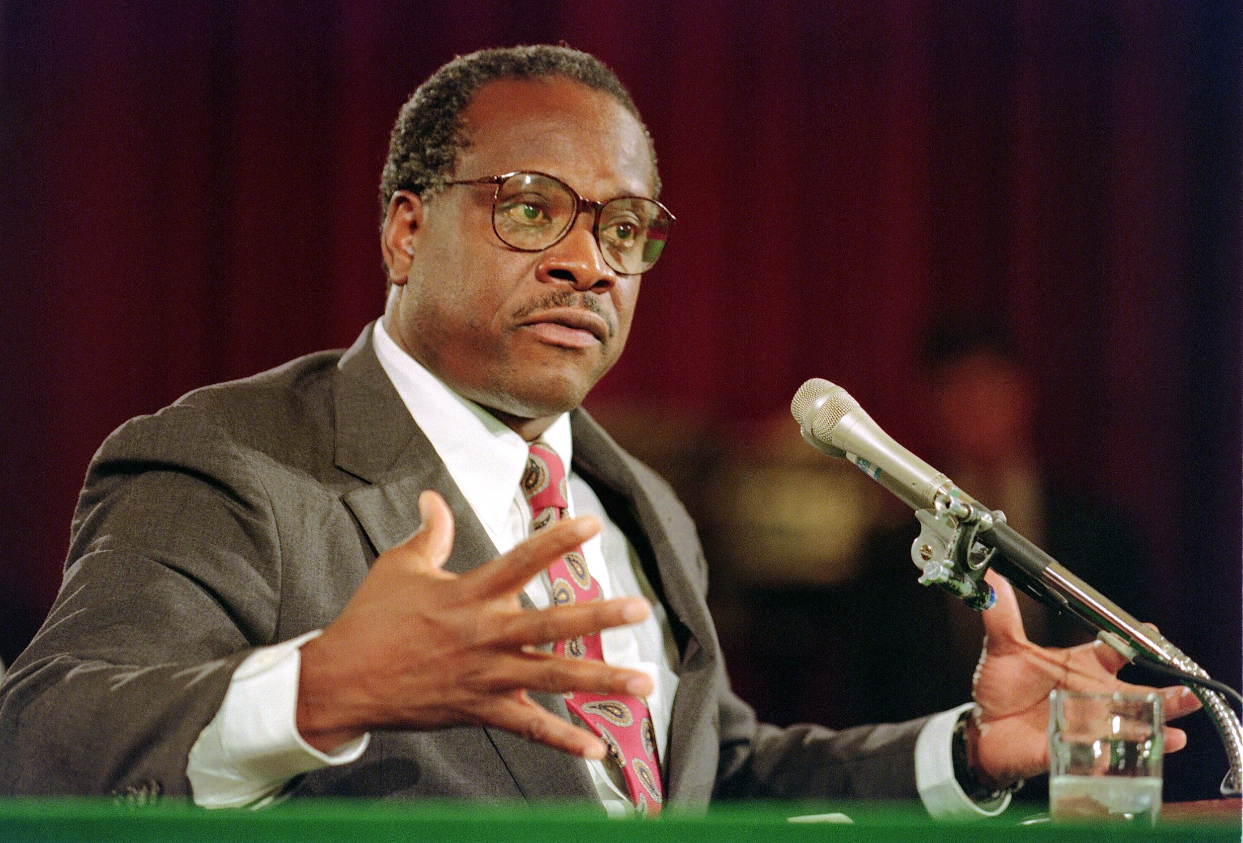 PHOTO: Supreme Court nominee Clarence Thomas gestures, Sept. 10, 1991, during confirmation hearings before the US Senate Judiciary Committee, in Washington.