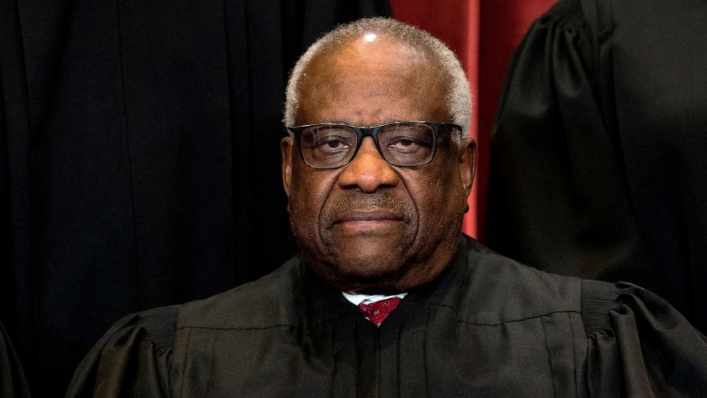 PHOTO: In this April 23, 2021, file photo, Associate Justice Clarence Thomas poses during a group photo of the Justices at the Supreme Court in Washington, D.C.