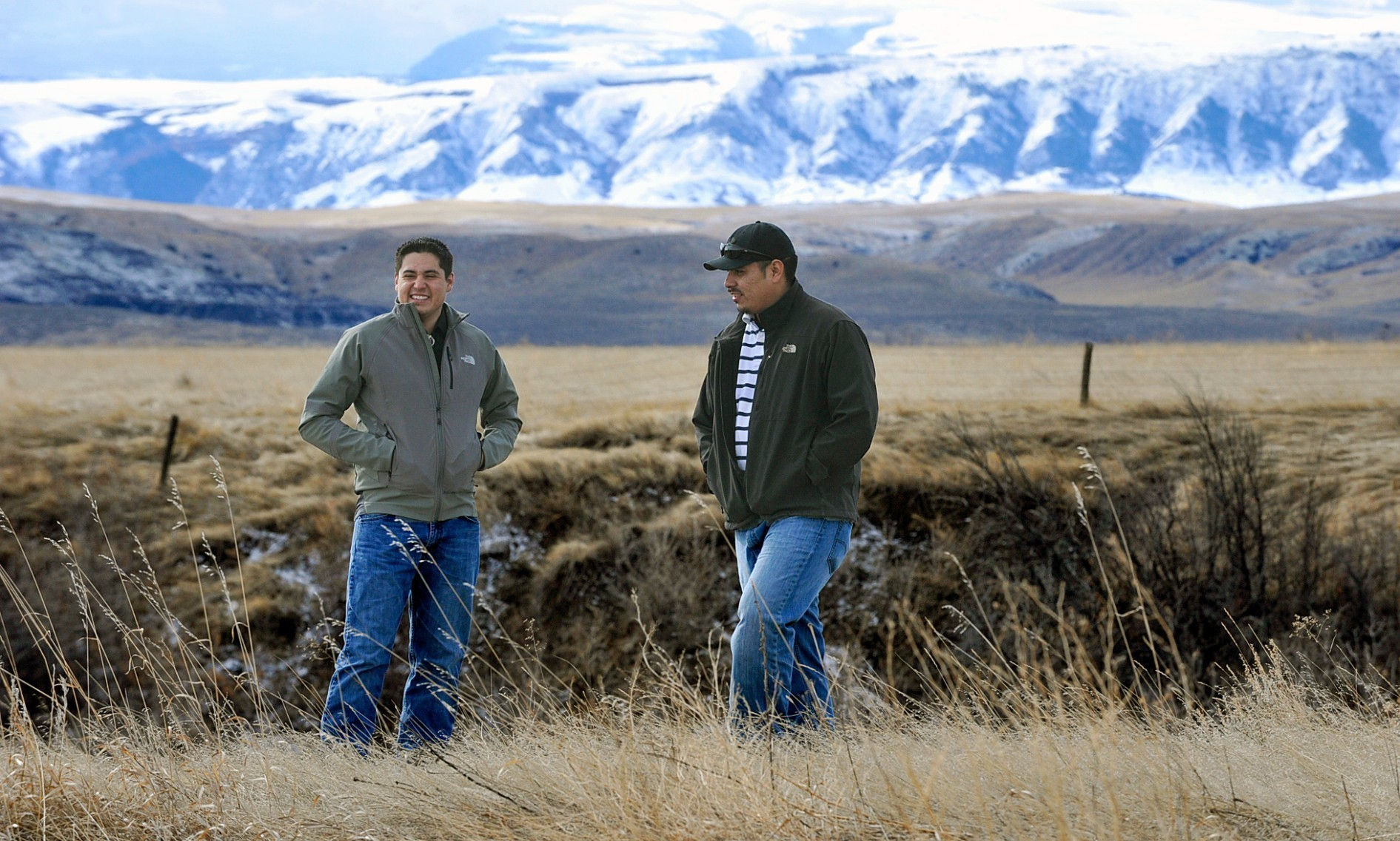 PHOTO: Clayvin Herrera, right, a game warden for the Crow Tribe, and fellow tribe member Ronnie Fisher, are shown on the Crow Reservation in northern Wyoming, Feb. 17, 2015.