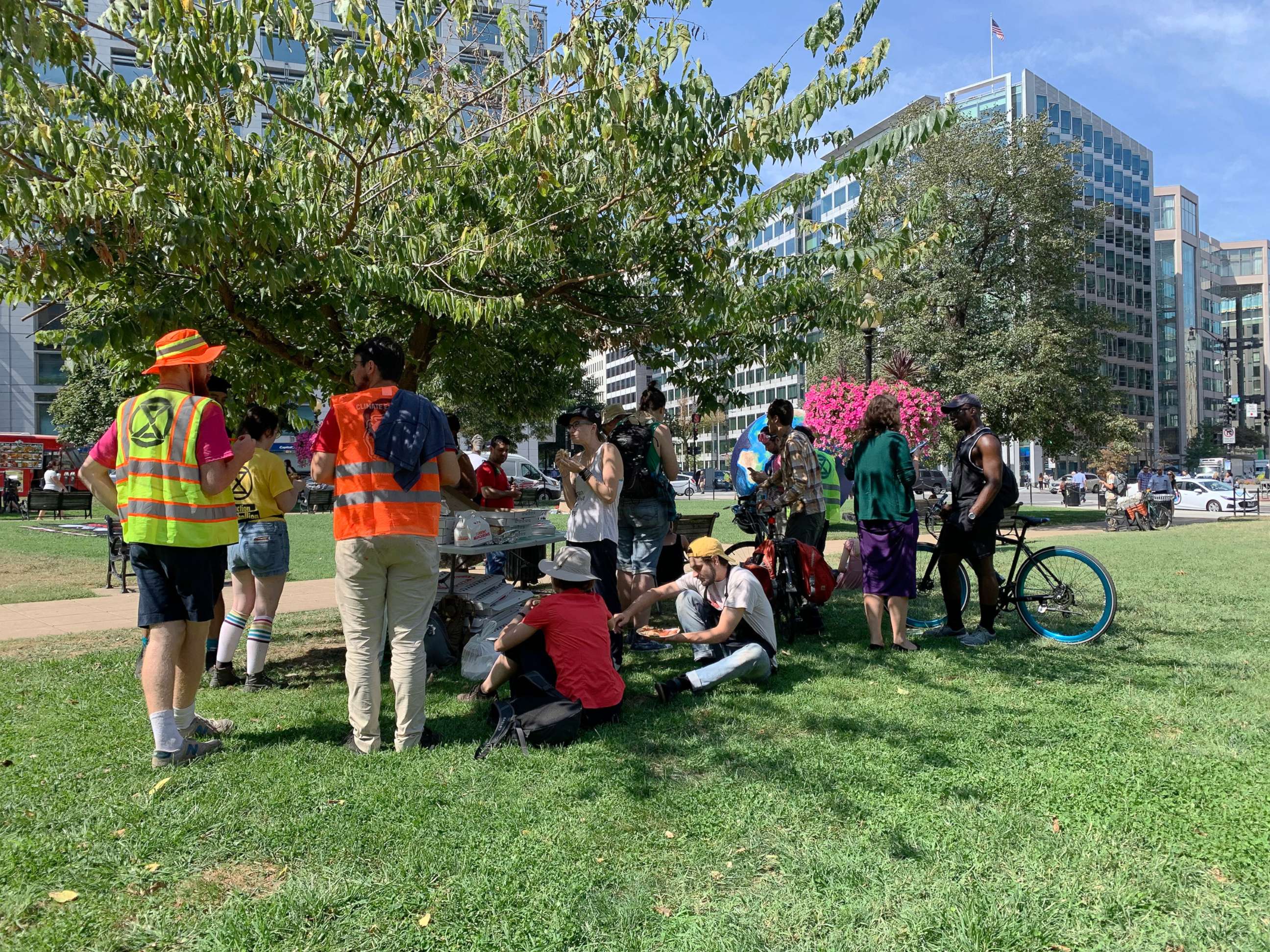 PHOTO: Climate change activists ate pizza after their protest finished in Washington on September 23rd, 2019. Some of the boxes were thrown away in trash cans.