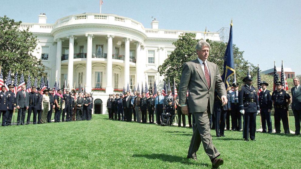 PHOTO: President Bill Clinton walks on the South Lawn of the White House, April 14, 1994, where he discussed his crime bill package with mayors and law enforcement officials. 